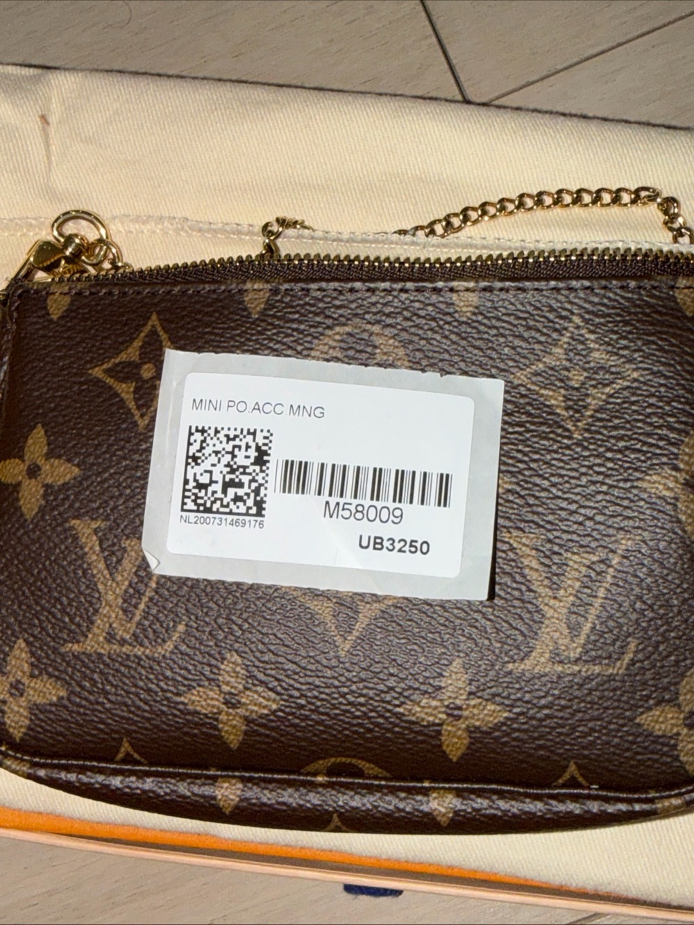 Louis Vuitton Monogram Mini Pochette in Brown with Gold Hardware - Picture 10 of 12